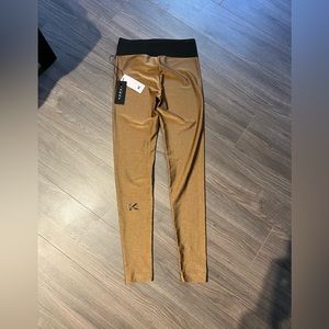 Koral Leggings. New With Tags. Shiny Gold.